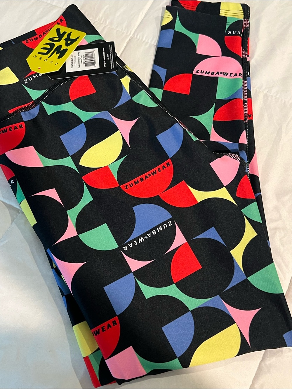 Zumba Fitness Kids Black Leggings with Red, Yellow, Blue, Green & Pink Geo Print - Picture 3 of 3